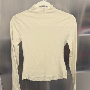 SKIMS Long Sleeve Mock Neck Top in Cream